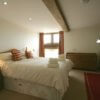 HB oxfordshire stone barn bedroom aa