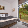 New forest retreat cabin bedroom as