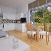 New forest retreat cabin sitting and dining area a