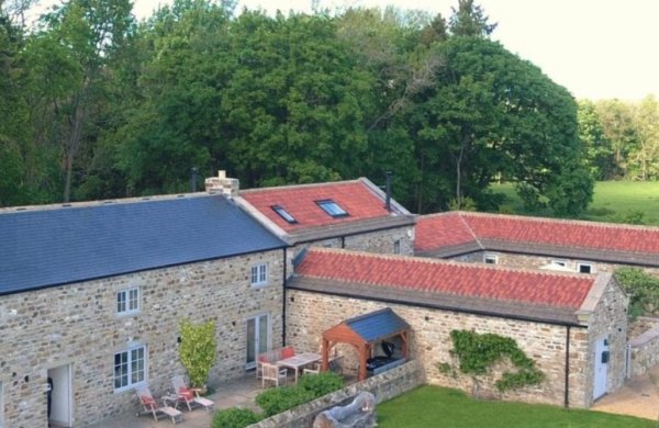 trio of yorkshire barns with hot tubs